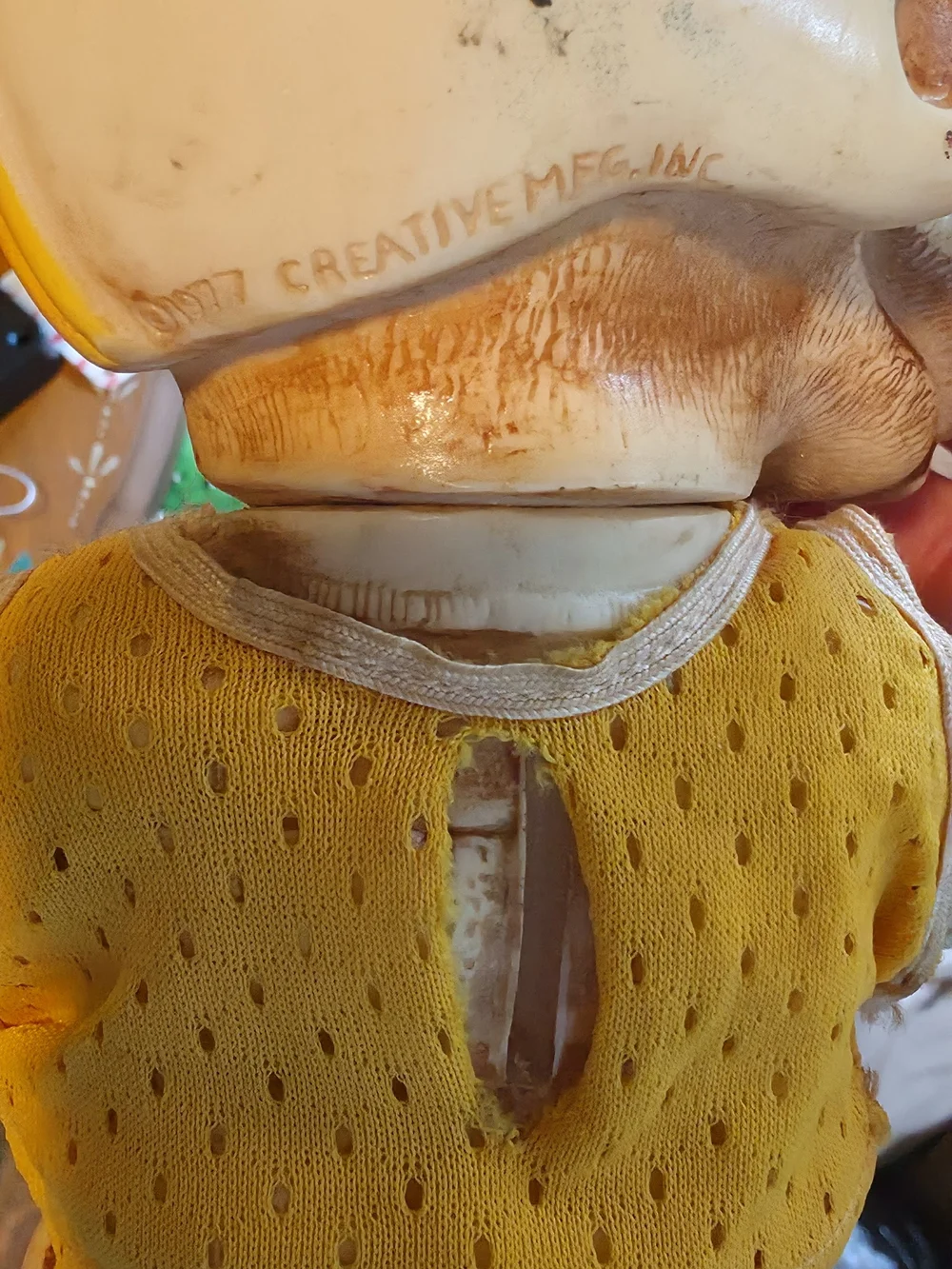 Vintage Dog Figurine Wearing Helmet - Yellow Accent